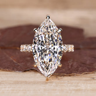 Marquise hidden halo engagement ring design.