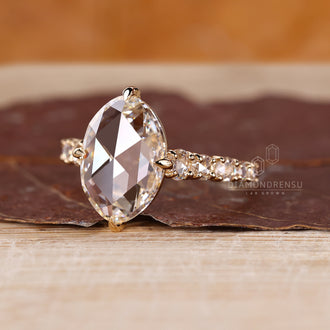 Pave setting ring with yellow gold engagement ring.