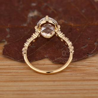 Compass claw prong setting with pave setting ring.