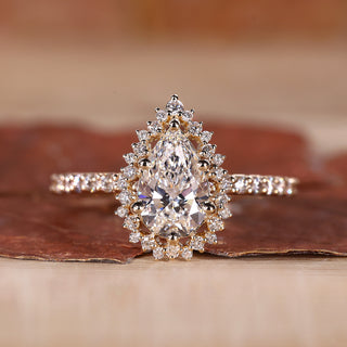Pear Halo Engagement Ring with a sparkling pear-shaped diamond.