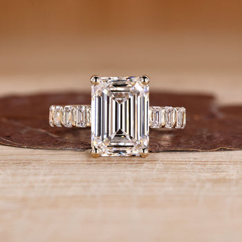 5 carat emerald cut diamond ring with emerald cut pave band.