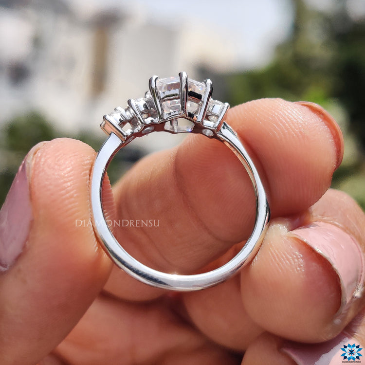 Diamondrensu ring featuring four stone moissanite setting in white gold