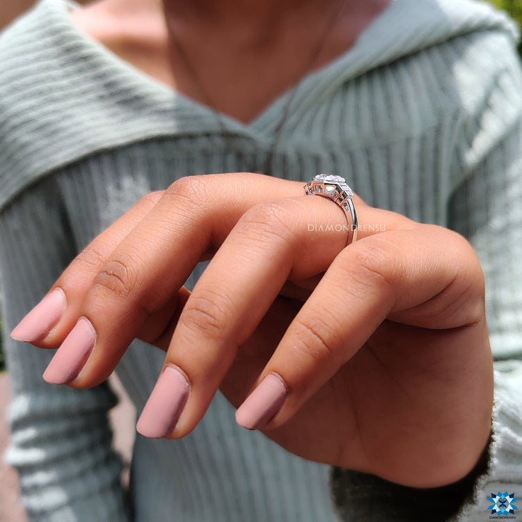 White gold engagement ring with handcrafted details.