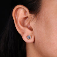 Stunning diamond earrings round designed for everyday elegance.
