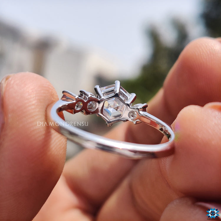 Custom moissanite ring in white gold with hexagon step cut design
