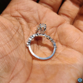 Elegant white gold hidden halo ring with marquise stones.