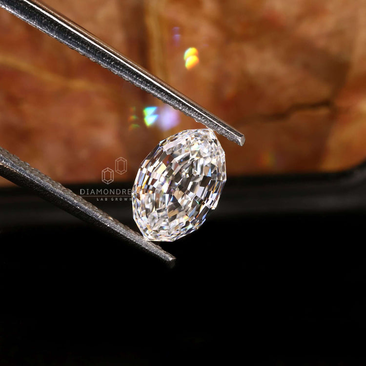 Loose lab grown diamond with a 1.2 carat oval step cut shape.