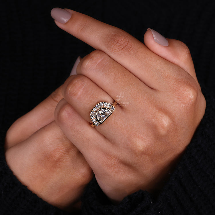 Semi halo setting with yellow gold engagement ring.