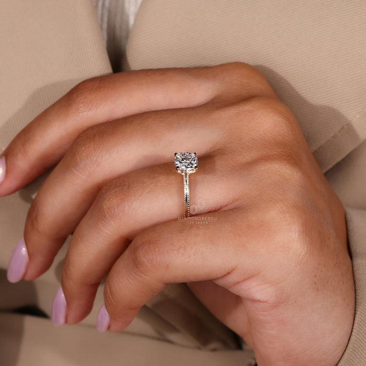 Custom Engagement Ring crafted using four tab prong ring and handmade ring design.