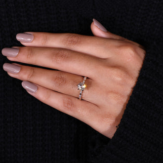 Claw Prongs securely holding a round diamond in place.