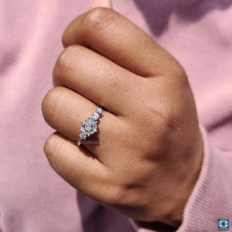 White gold ring featuring hexagon step cut moissanite engagement ring