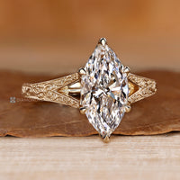 Split shank paired with vintage style and tulip setting.