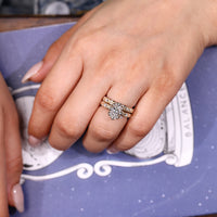 Vintage style oval bridal set with four claw prong setting.