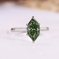 IGI certified Dutch marquise diamond ring with six claw prong setting.
