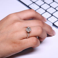 IGI certified round diamond engagement ring with round cut pave band.