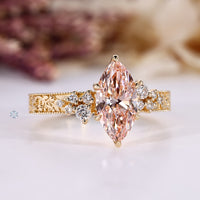 Art Deco details shape this marquise engagement ring.