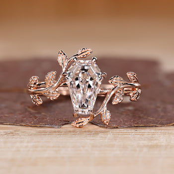 Coffin diamond ring with nature inspired style and solitaire design.
