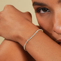 5 carat lab diamond bracelet in yellow gold.