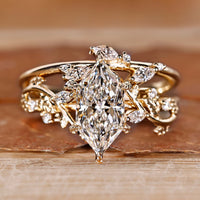 Dutch marquise diamond engagement ring with wedding band.