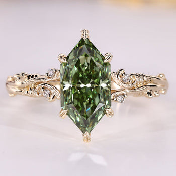 Dutch marquise ring with nature inspired design and round side stones.