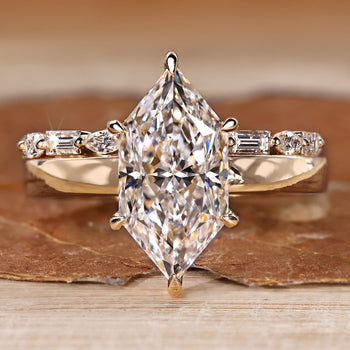 Dutch marquise wedding ring with round cut hidden halo.