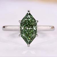 Dutch marquise diamond ring with green lab grown diamond.