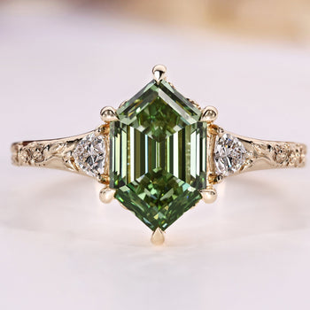 Green hexagon shape diamond ring.