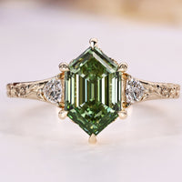 Green hexagon shape diamond ring.