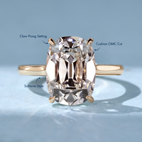 Solitaire style cushion old mine cut diamond ring.