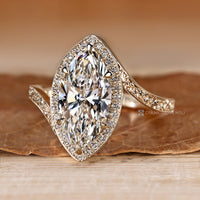 Marquise lab grown diamond ring with halo style.