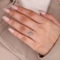 Coffin center stone ring with five stone arrangement.