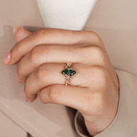 Cathedral setting with leaf style prong setting.