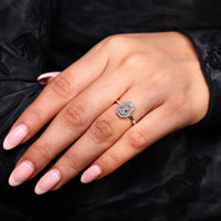 Handmade coffin engagement ring with open gallery style.