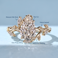 Pear cut diamond ring with bypass setting.