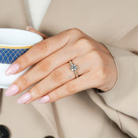 Art deco round cut diamond ring with hidden diamonds.