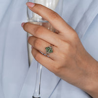 Nature-inspired engagement ring with a tulip setting.