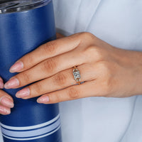 Princess cut diamond ring with a tulip setting.