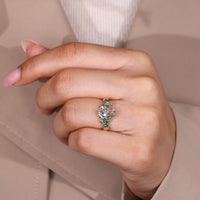 Handmade coffin engagement ring with four claw prong setting.