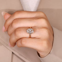 Bezel engagement ring in a solitaire style.