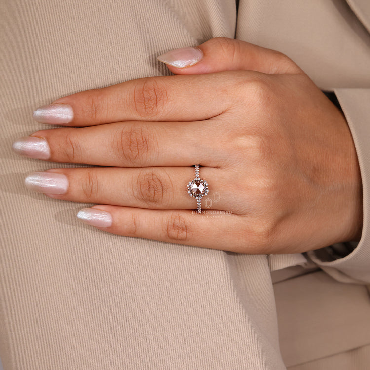 Custom diamond ring with rose cut halo and pave setting.