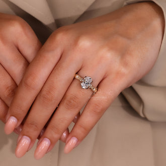 Marquise side stone ring designed with elegant handcrafted touches.