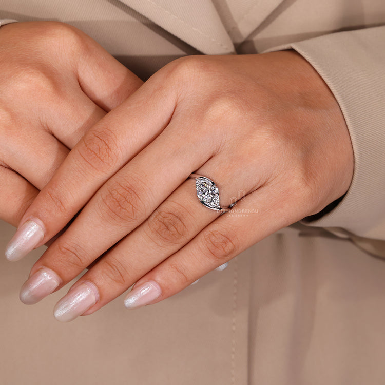 IGI certified marquise cut diamond ring.