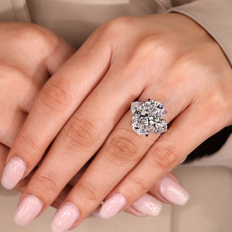 Trillion side stone three stone diamond ring.