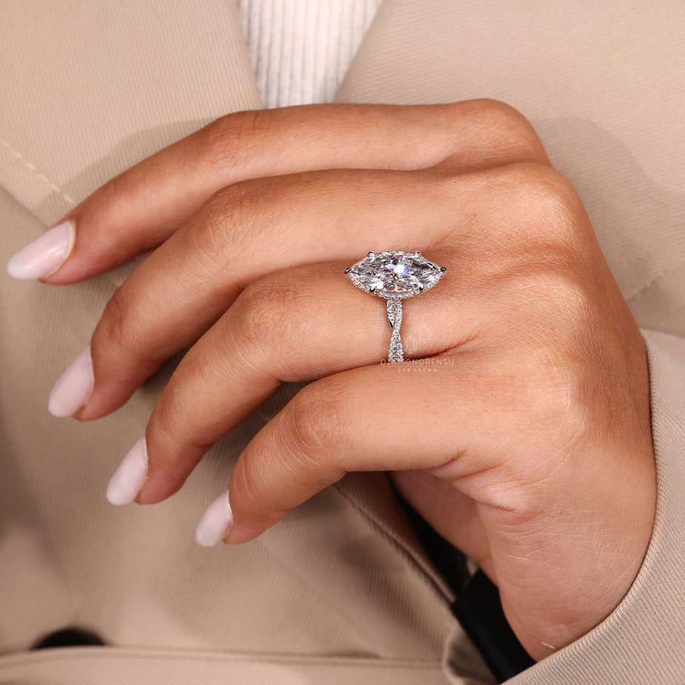 Six claw prong setting engagement ring design.