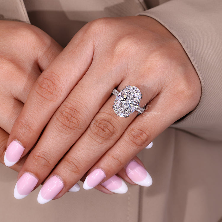 Diamondrensu engagement ring with pave band.