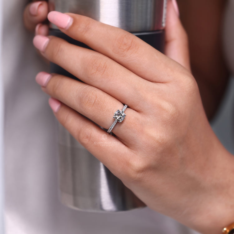 A pave setting helps the band sparkle from all sides.