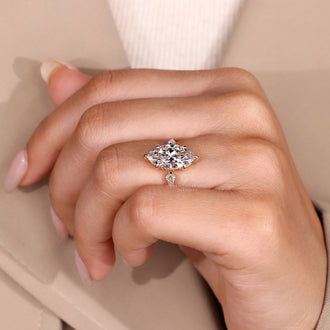 Six claw prong marquise diamond ring.