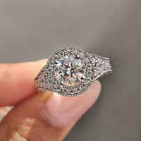 Vintage moissanite ring featuring a beautiful vintage moissanite engagement ring set for a classic look.