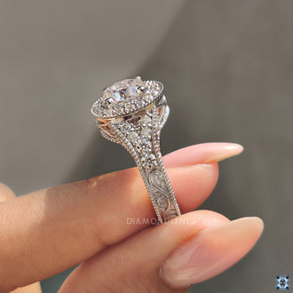 Milgrain engagement ring with a vintage touch and sparkling moissanite stone.