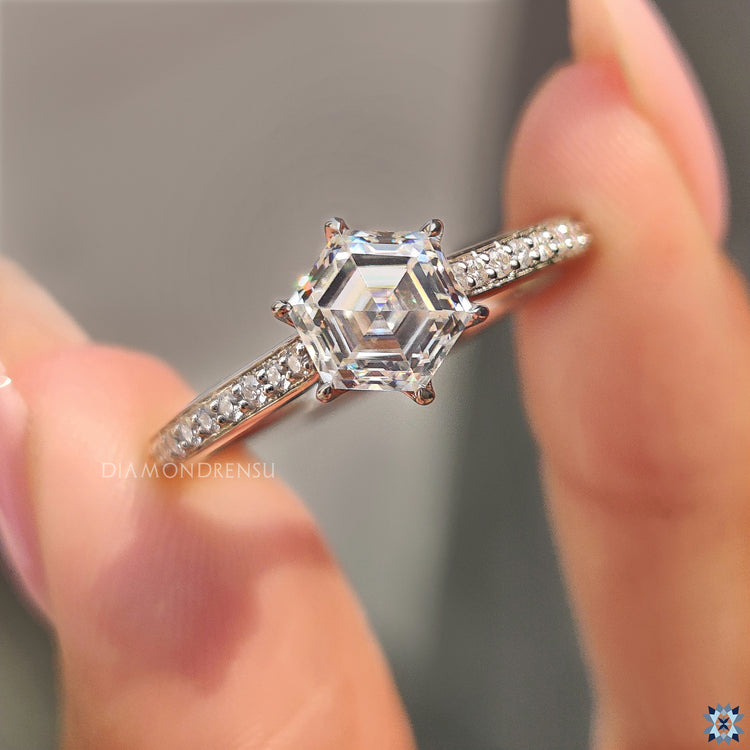 6 prong engagement ring with a hexagon moissanite for secure brilliance.